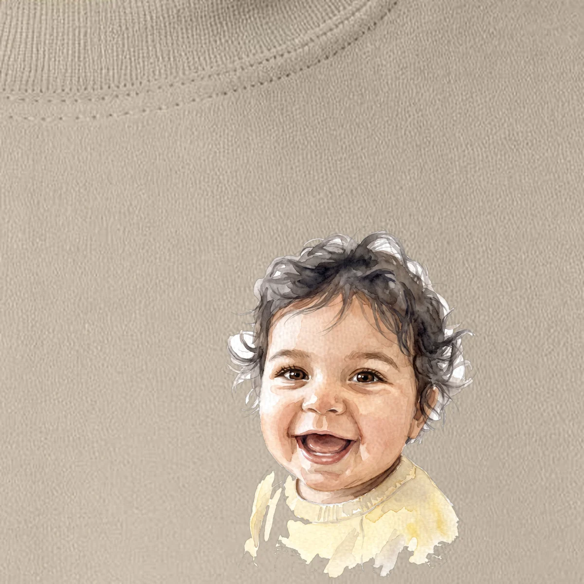 Watercolour portrait of a smiling baby printed on the left chest of a sand crewneck sweatshirt