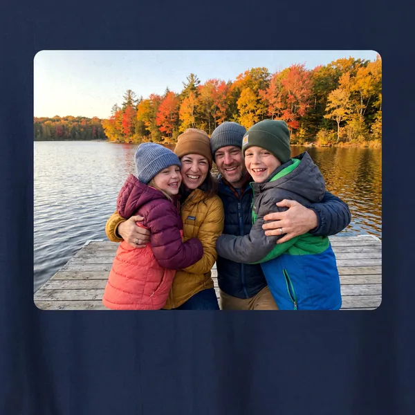 Custom photo blanket: a family photo by a lake in autumn printed on a navy fleece blanket, close up